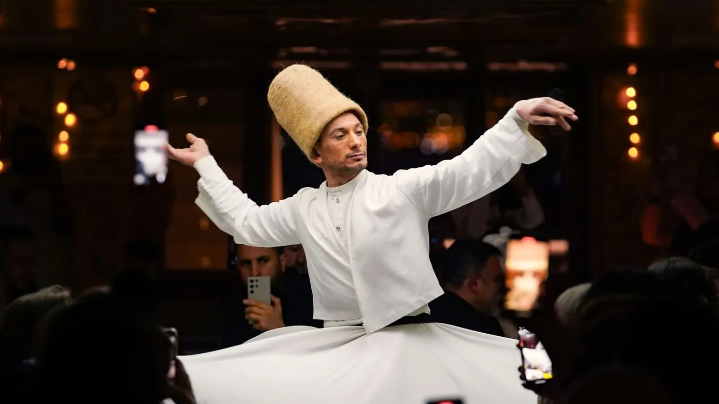 Whirling dervish performing the Mevlevi sema on board