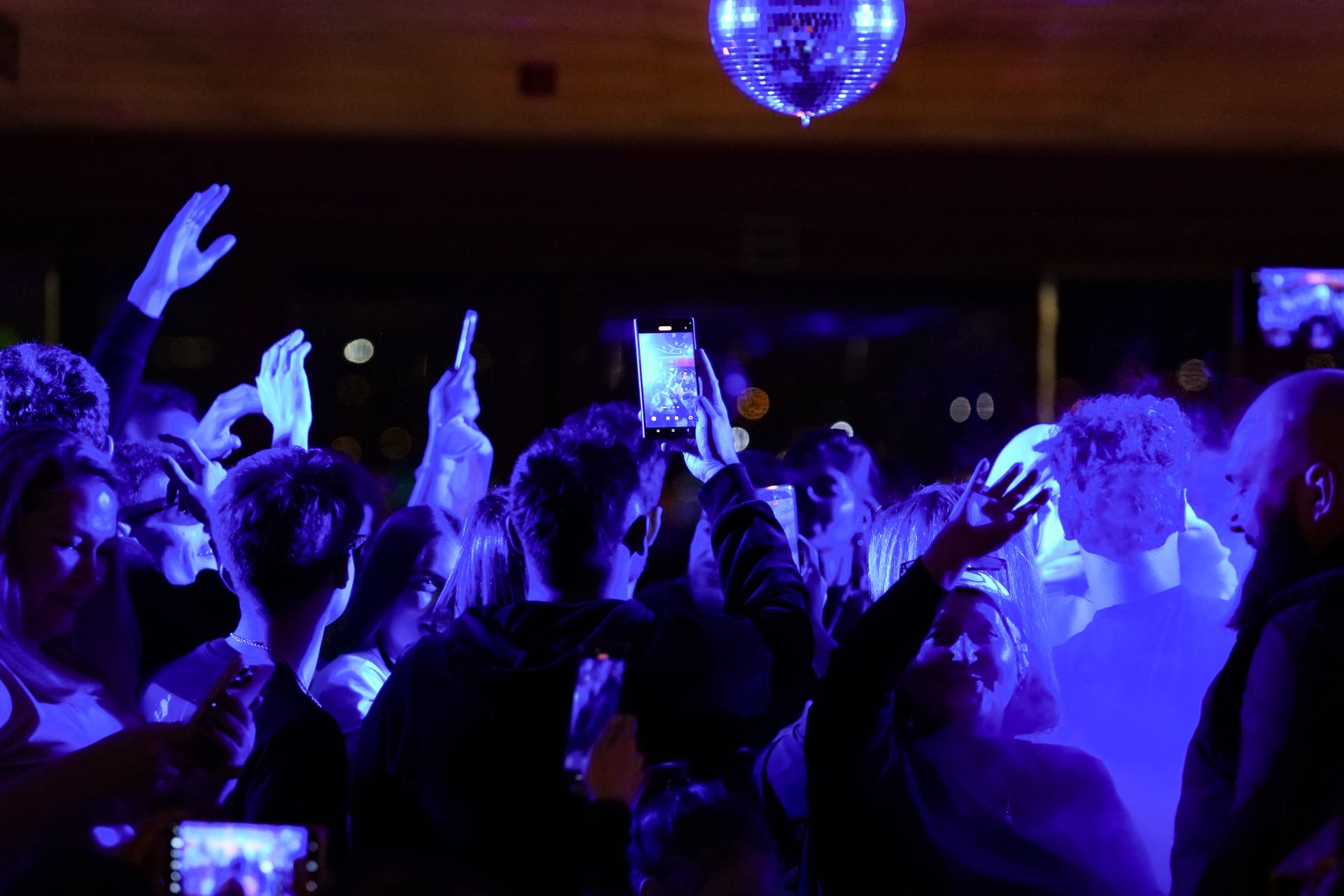 Guests dancing in the salon during the after-party of the Bosphorus dinner cruise