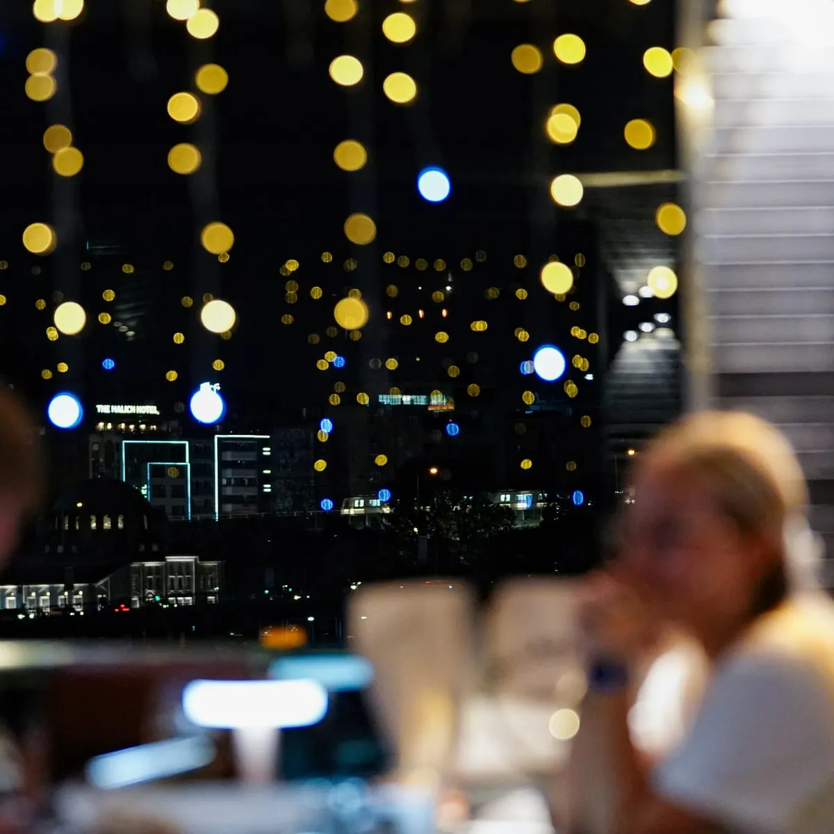 Galata Tower seen through the fairy lights of the salon window
