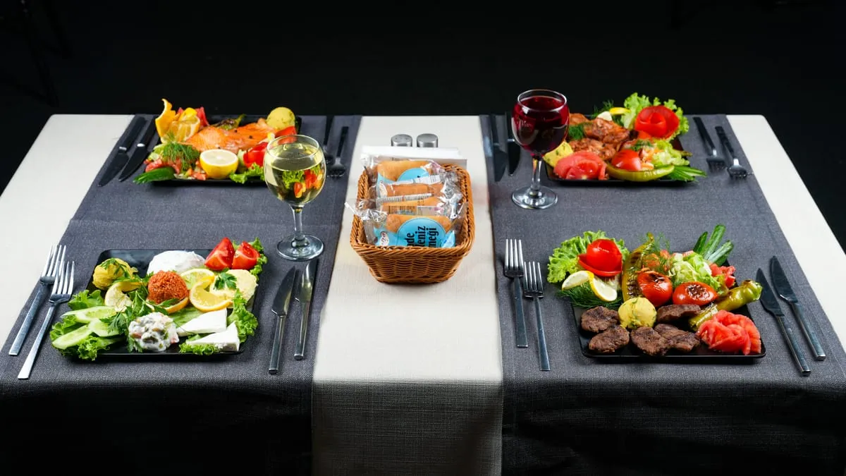 Main course plates: grilled chicken, meatballs and salmon with salad